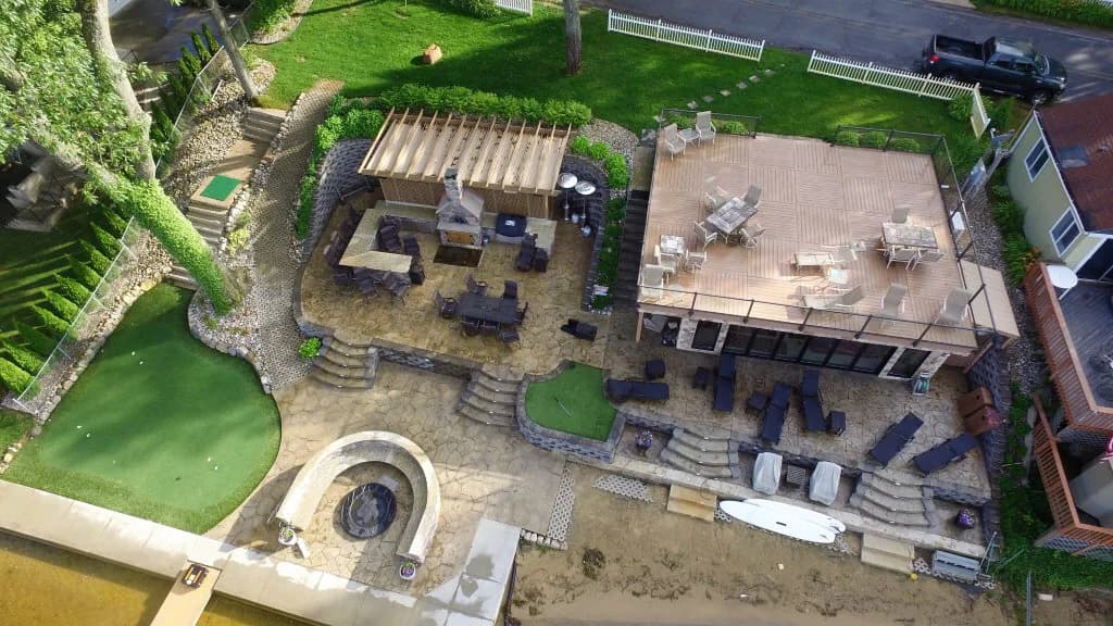 Aerial view of a completed lakefront landscaping project in Southwest Michigan