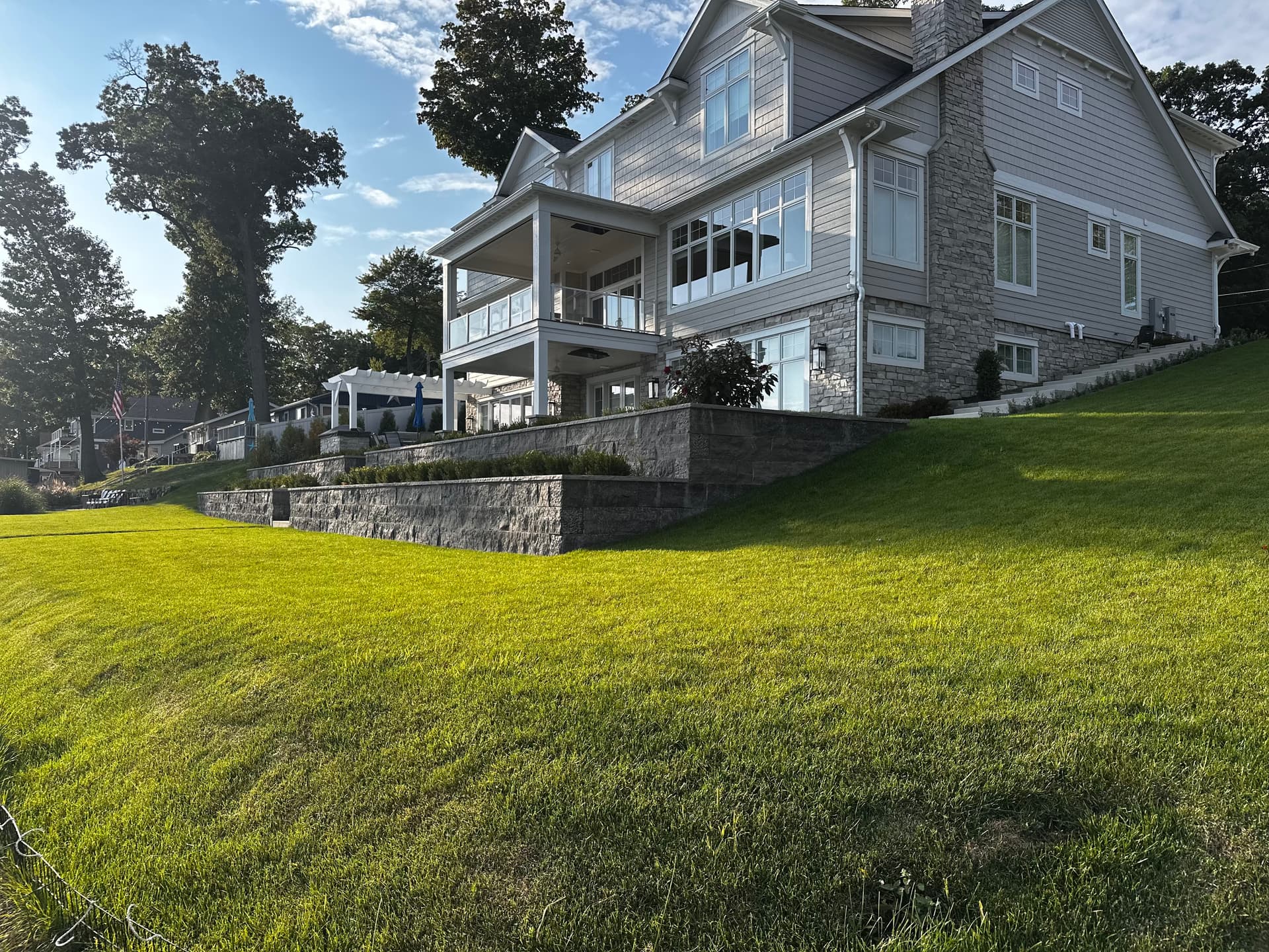 Large terraced hillside retaining wall against a lake, Southwest Michigan